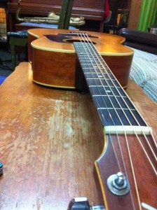“The fretboard is Brazilian rosewood,” he said, “beautiful, rare now, an endangered species.” (Euan's guitar, also pictured at top of this post.)